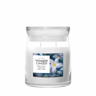 Yankee Candle Midnight Jasmine Signature Medium Jar avec fleurs de jasmin sur l'étiquette